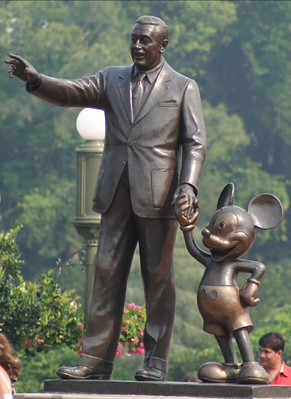 A statue of Walt Disney and Mickey Mouse at Disney World
